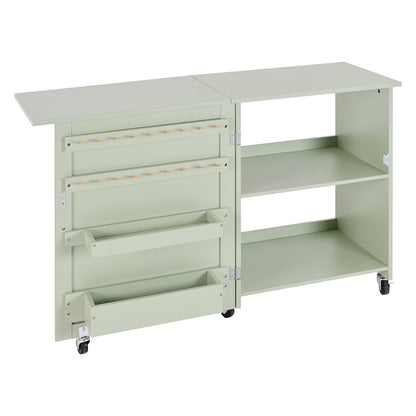 Hopfällbart sybord, multifunktionellt symaskinsbord med kompakt design, hjul, träpinnar, förvaringsbrickor och hyllplan, magnetiskt dörrlås, hobbystation och sidobord för hemmet, ljusgrön